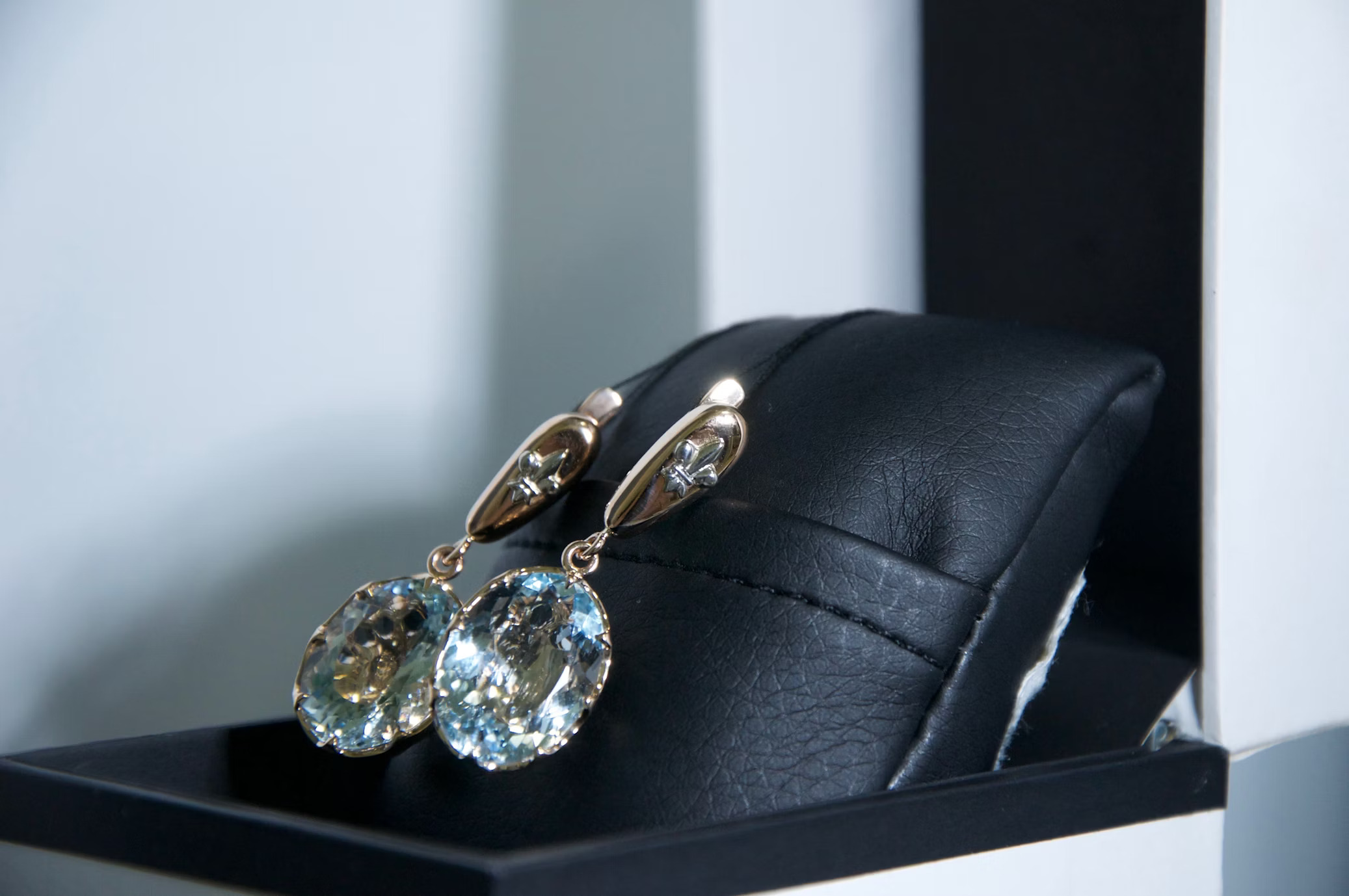 The Healing Power of Gemstones: Wellness Benefits of Wearing Precious Stone Dangling Earrings